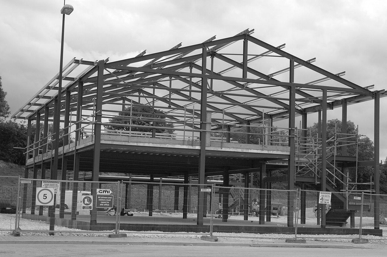 Photo of steel frame office building under construction.