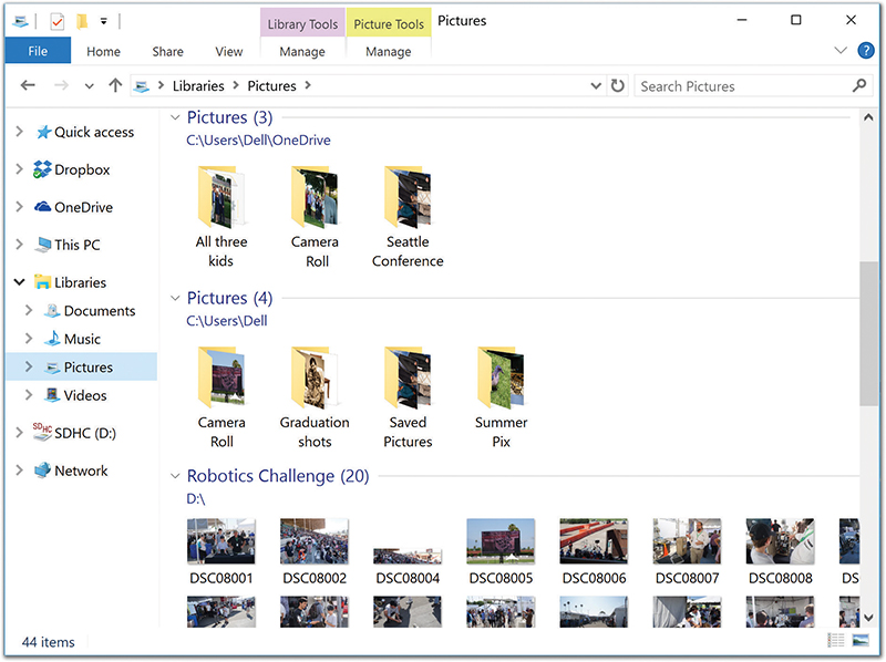 The Pictures library window seems to contain a bunch of photo folders, all in one place. But don’t be fooled; in real life, these folders are scattered all over your system.