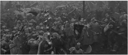 Figure 1.2 Frame as window in Gladiator. In this shot from Gladiator (Scott, 2000), the film frame functions more like a window, creating the sense of a real battle as the clashing armies chaotically spill outside the frame. Here, the rectangular frame structures the visual field less formally, forcing the audience to scan the frame to discover areas of significance. Source: Copyright 2000 Dreamworks Pictures.