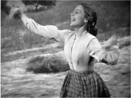 Figure 1.34 Converging motion vector outgoing shot. . . Converging motion vectors are created with studio tracking shots set against rear screen projections, first of Melanie Hamilton (Olivia de Havilland) running to meet . . .
