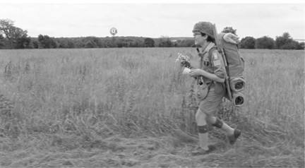 Figure 1.36 Converging motion vector outgoing shot. . . Using a widescreen format, Wes Anderson frames wide shots with strict rectilinear staging that tracks and slowly converges right to left motion. . .