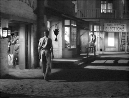 Figure 4.17 Shooting Liberty Valance: version 1. Ranse Stoddard (James Stewart) kills a local thug who terrorizes the town – Liberty Valance (Lee Marvin) – or so he thinks. The first version of the event is shown from Stoddard’s point of view. Source: Copyright 1962 Paramount Pictures.