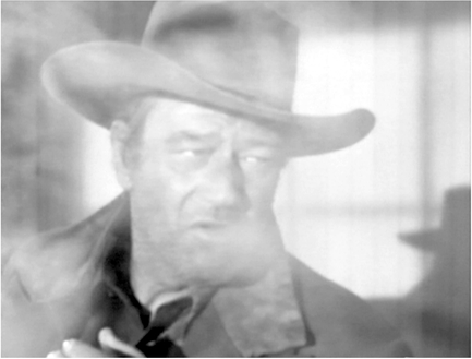 Figure 4.18 Shooting Liberty Valance: version 2, recounted enactment. A hybrid form of flashback is the recounted enactment, where a character begins telling an earlier narrative event . . .
