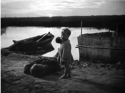 Figure 6.1 Paisan (Rossellini, 1946). André Bazin argues that Rossellini’s editing in Paisan creates “an intelligible succession of events,” but asks more of the viewer. Just as one must find one’s own path in crossing a river stone by stone, the realist film asks the viewer to make their own connection between the “stones,” the narrative events that are present in the film. Here, the crying baby standing with the dead bodies of his parents is a “fact” that forces us to make narrative connections. Source: Copyright 1946 Arthur Mayer & Joseph Burstyn.