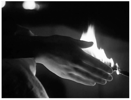 Figure 7.3 Mirror. . . .to a recurring interstitial shot of a hand .a cut on idea to the “flaming hand” shot that recurs throughout the film, a suggestion of symbolism that Tarkovsky consistently denies in his work. Source: Copyright 1975 Mosfilm.