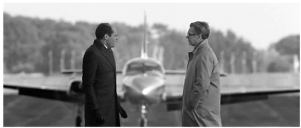 Figure 8.5 Internal rhythm: telephoto lens in Tinker Tailor Soldier Spy (Alfredson, 2011). In this shot, the internal rhythm of the primary motion – the plane approaching down the runway – is slowed by an extremely long telephoto lens. Source: Copyright 2011 Focus Features.