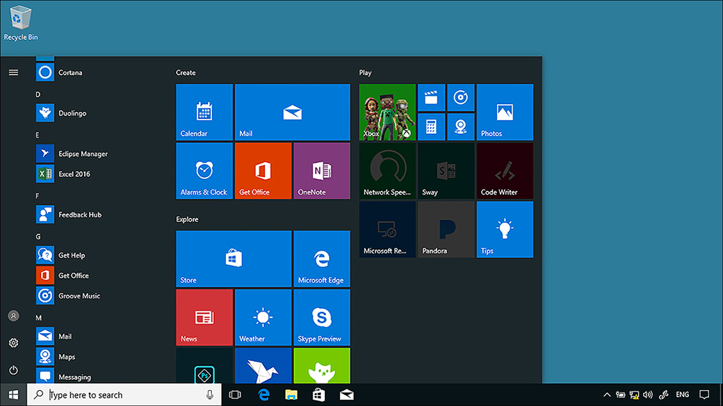 A screenshot shows Start displayed as a menu. Visible are three areas containing tiles: Create, Play, and Explore. In the Create area, the Calendar, Mail, Alarm & Clock, Get Office, and OneNote apps can be seen. In the Play area, a number of apps are visible, including: Xbox, Sway, Photos, Groove Music, and Calculator. The Explore area contains MSN News, Store, Microsoft Edge and others. The taskbar is visible across the bottom, containing a number of shortcuts for commonly used applications. On the left, an alphabetical list of all apps is shown.