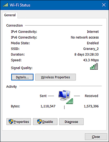 A screen shot shows the Wi-Fi Status dialog box displaying Connection details and Activity details.