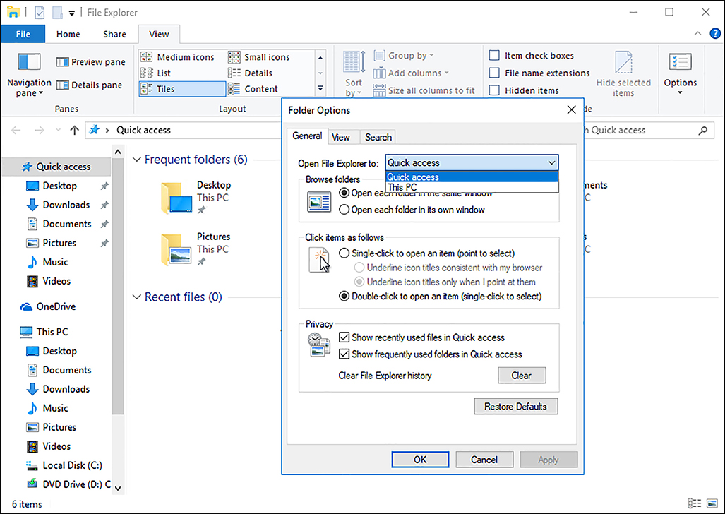 A screen shot shows File Explorer with the Folder Options dialog box open. On the General tab is an Open File Explorer To drop-down menu with the options Quick Access or This PC.