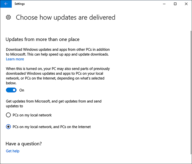 A screen shot shows the Updates From More Than One Place toggle option is enabled. The “Get updates from Microsoft, and get updates from and send updates to” option offers two choices: PCs on my local network (which is selected), and PCs on my local network and PCs on the Internet.