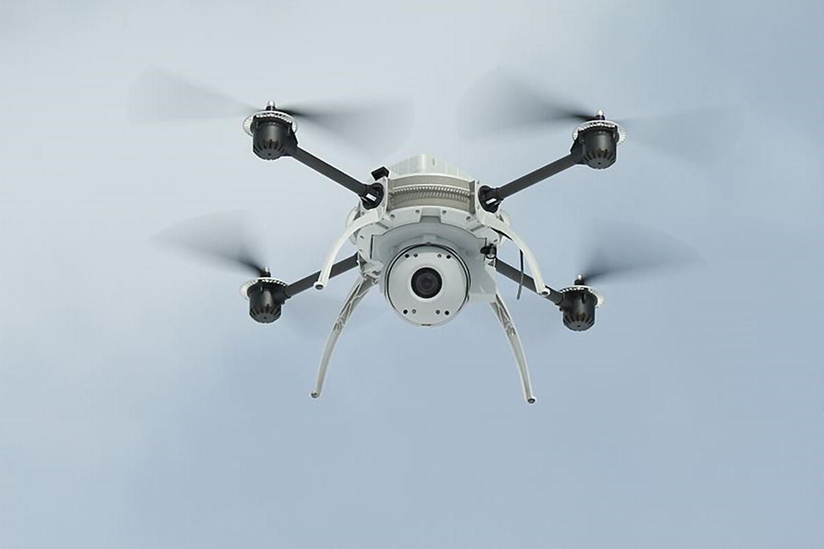 Photo displaying Aeryon Scout VTOL MAV with gyro‐stabilized camera payload.