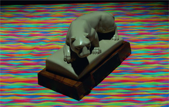 Figure 8.44: Lion and fabric under Roscolux 70 incandescent light, camera set to auto white balance.
