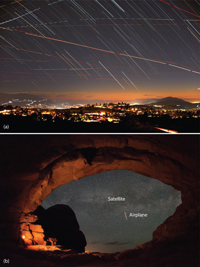 20.6 Nightscape nuisances: (a) Multiple airplane lights appear in busy skies over southern California even after only an hour or so in this star trail image. (b) A satellite and an airplane streak across the middle of this Milky Way shot in Arches National Park in Utah.