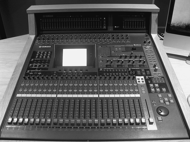 Figure 10.35 The Yamaha O2R96 studio at SAE, London. This desk provides four layers, each consisting of 24 channels (or buses). Had this desk’s layers been unfolded, it would be four times the size.