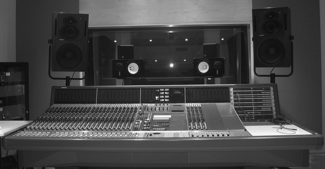 Figure 8.3 The NEVE VRL studio at SAE, London. The three types of monitors can be seen here: the full-range are the Genelec 1037Bs, the near-fields are the NS10s and the mini-speakers are the AKG LSM50s.