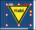 A screenshot shows the "Selection tool" being used to select the Yield sign graphic.