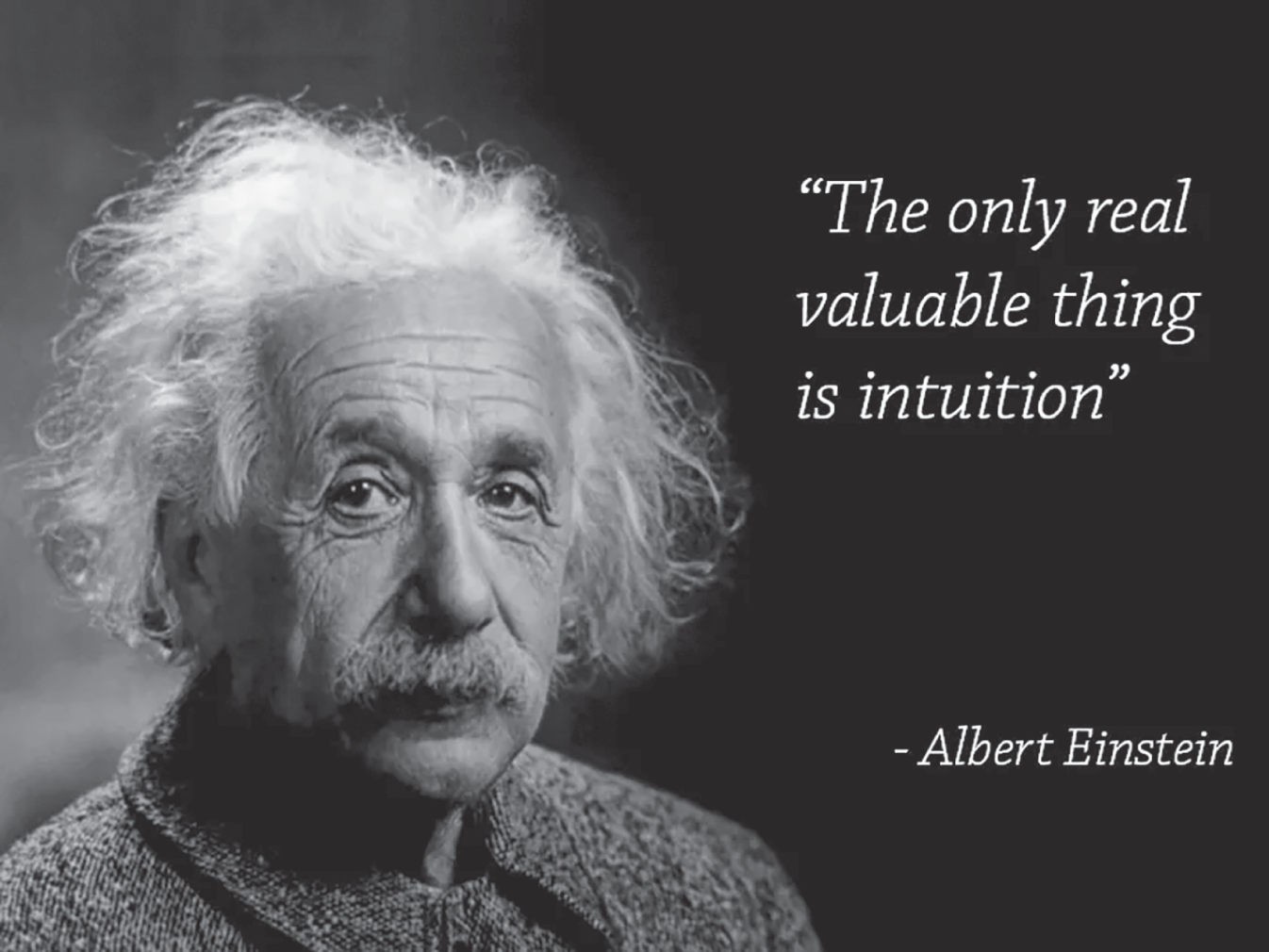 Photograph of the scientist Albert Einstein with one of his famous quotes displayed.