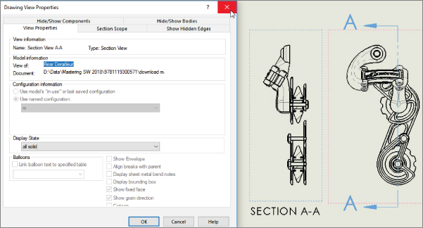 Drawing View Properties dialog box with selected View Properties tab displaying panels for View information, Model information, etc. (left) and a section view of the assembly with excluded bolts and pins (right).
