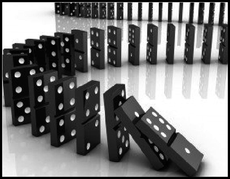 Photo of toppling dominoes.