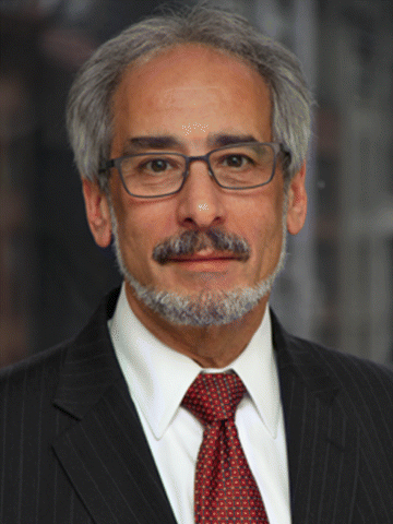 A photograph of author, Mark B. Nadler.