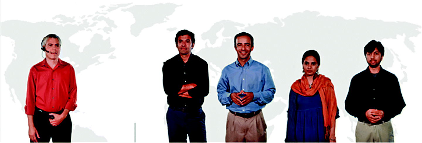 The photograph of a software development team with a background of world map. As we move from left to right, Rick is the project manager, Bhavesh Chatterjee is the team lead, Azim Ahmed, is the developer; Priya Vikram, the designer; and Sanjay Ramaswamy, the test engineer