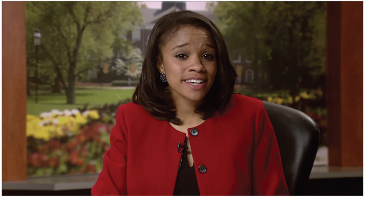 Figure 13.9 Prior to high-definition video, a heavily saturated red outfit such as the one worn by this television newscaster was considered taboo because it tended to bleed (or smear) on a low-resolution SD monitor. High-definition (HD) cameras handle color much better. Still, as a general rule, on-camera talent should avoid wearing predominantly black or white clothing. Because black is naturally dark and white is so highly reflective, using either color as the base color in a shot will negatively affect the exposure of mid-tone colors in the image. For best results go with natural mid-tone colors for clothing and avoid the extremes as much as possible.