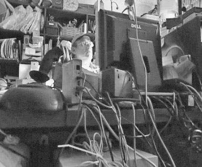 Figure 6.6 Ron Alford’s cluttered office in Never Enough reveals character and provides an ironic twist given Alford’s work as a de-cluttering consultant.