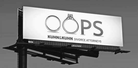 Figure representing a billboard ad for Kuhn & Kuhn divorce attorneys depicting word “OOPS”, where letters O and O are replaced by male and female wedding rings, respectively.