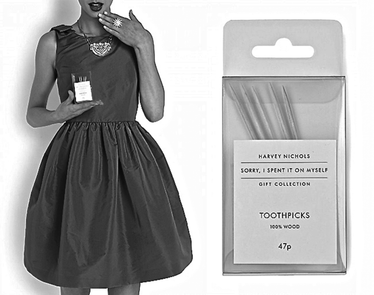 Figure representing an ad campaign for Harvey Nichols where on the left-hand side a lady is holding a pack of Harvey Nichols “Sorry, I Spent It on Myself,” gift collection toothpicks in her right hand and her left hand is on her chin, as if being sorry. On the right-hand side a pack of Harvey Nichols “Sorry, I Spent It on Myself,” gift collection toothpicks is displayed.