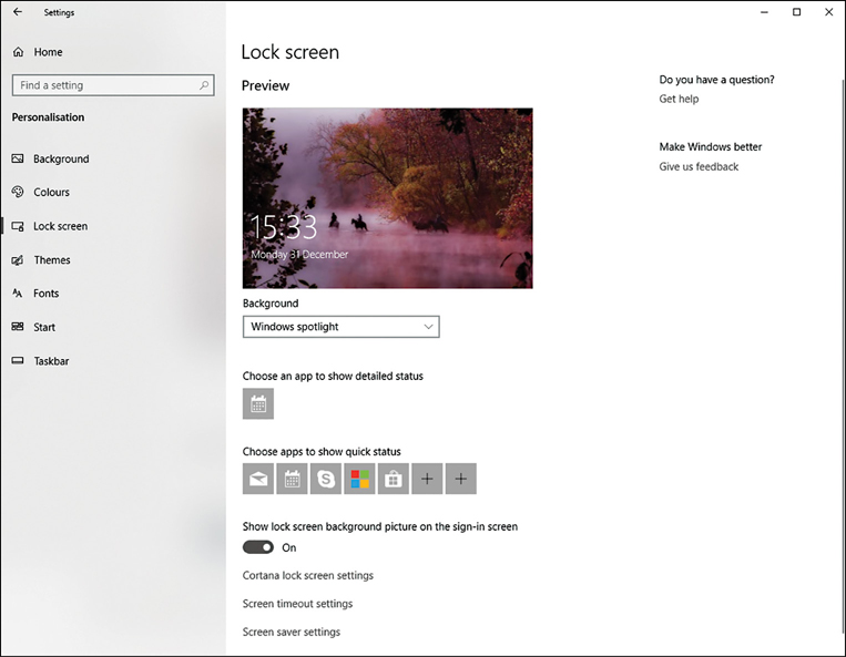 This screenshot shows the Personalization section of the Settings App. The Lock Screen tab is in view, and on the right side of the screen is a Preview of the lock screen displaying an autumnal nature picture. Below this is the heading Background, and a drop-down menu showing Windows Spotlight. Below this is an option heading to Choose an App To Show Detailed Status, with the Calendar icon shown. Below the Calendar icon is an option to Choose Apps To Show Quick Status, with tiles for Mail, Calendar, Skype, and more. The last option is to toggle the Show Lock Screen Background Picture On The Sign-In Screen (On). Lastly, there are two links to configure Screen Timeout Settings and Screen Saver Settings.
