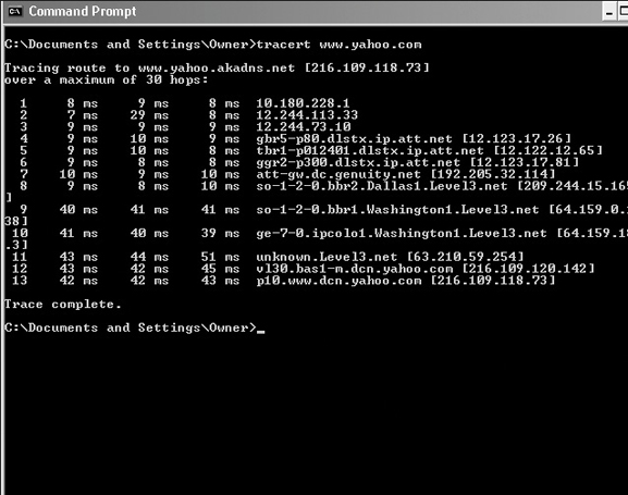 Several options of the command tracert are shown in a command prompt window. The tracing route of www.yahoo.akadns.net displays the details of the destination of the packet, time taken to travel, and also all the intermediate hops it traveled.