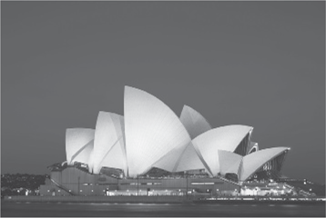 The Sydney Australia opera house lit for the evening.
