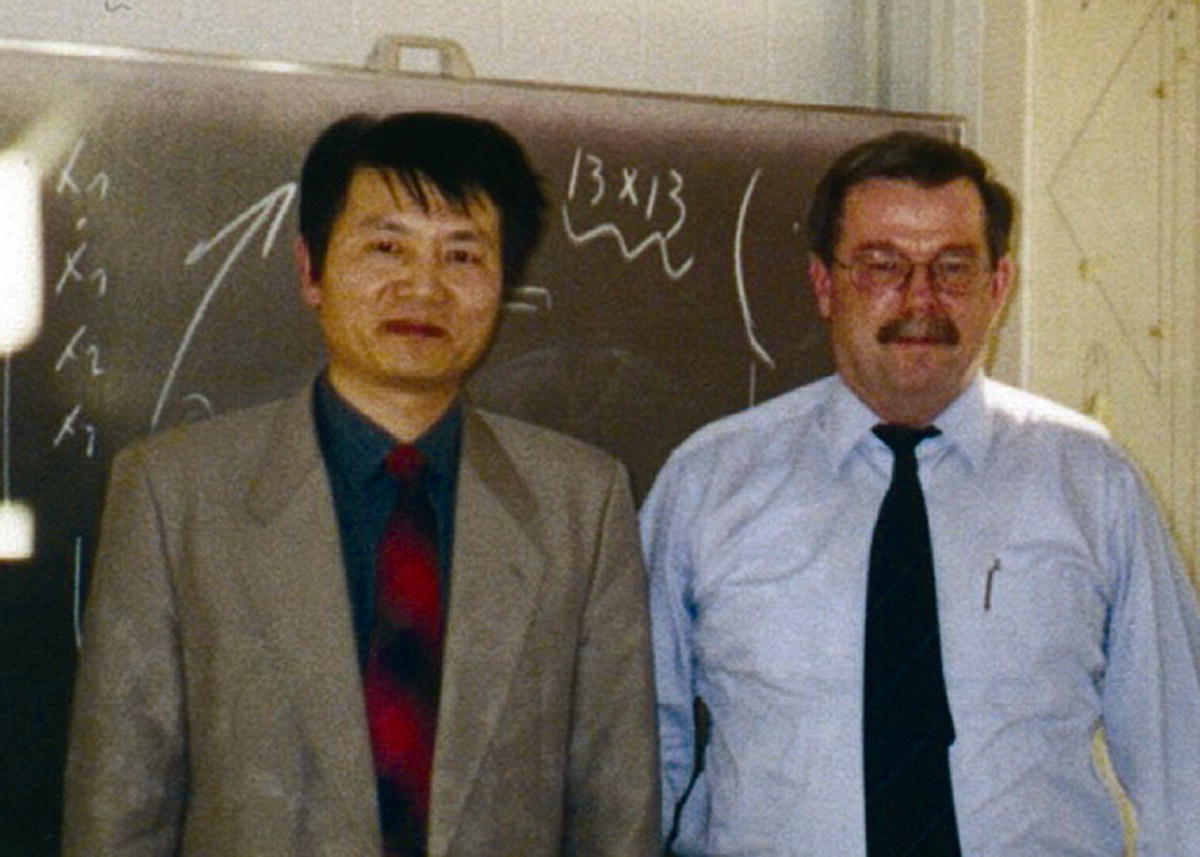 Photo of Professor Xiaoting Rui (left) standing beside Professor Horst Irreties (right).