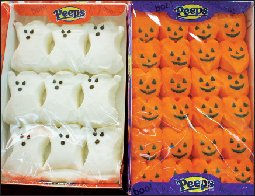 Photo shows a pack of Peeps marshmallow chicks and a pack of marshmallow bunnies.