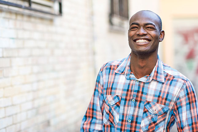 Photo shows a smiling Taylor Evans.