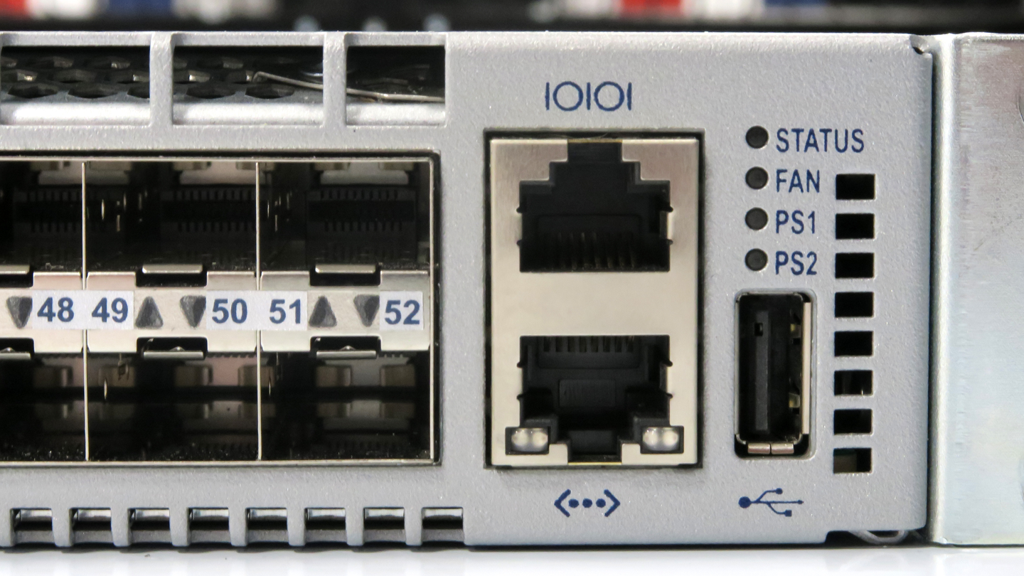 USB, management, and console ports on the front of a 7150S-52 switch