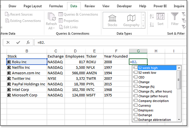 Cell B2 contains a stock icon and Roku Inc. Formulas return the Exchange, Employees, Ticker, and Year Founded. In G2, type =B2 followed by a period. A list box appears with many choices such as 52 Week High, 52 Week Low, CEO, Change, and Change (%). Choose any item from the list and press Tab to add that formula to the cell.