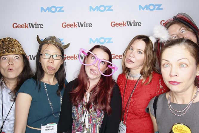 Photo illustration of young women attendees making various faces facing the viewer at the Geek Moz gala.