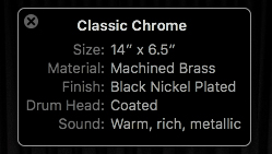 A screenshot shows the description of the Classic Chrome snare (selected snare). The following details are shown in the description- Size: 14 inches times 6.5 inches; Material: Machined Brass; Finish: Black Nickel Plated; Drum Head: Coated; Sound: Warm, rich, metallic.