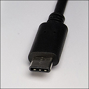 An image shows a cable connector with a small flat rectangular pin.